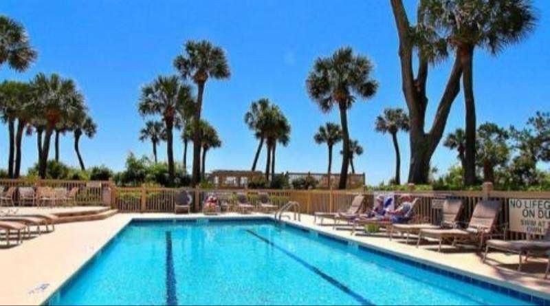 swimming pool and surrounding area at the Hampton Place villa complex