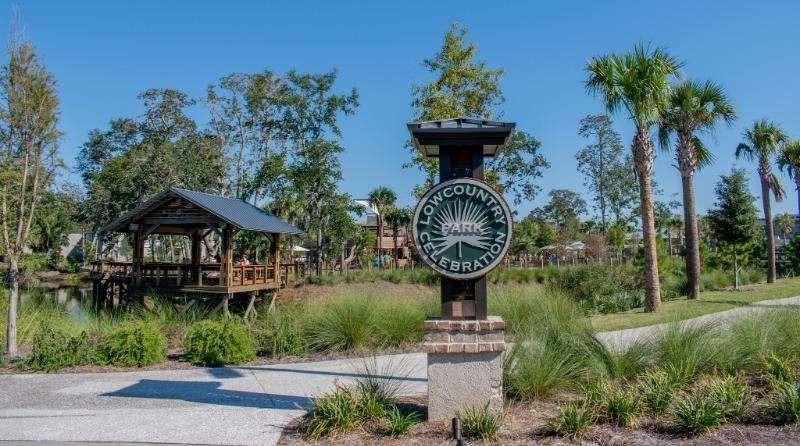 A scenic view of Forest Beach Lowcountry Celebration Park, featuring lush greenery and open areas, perfect for events or relaxation.
