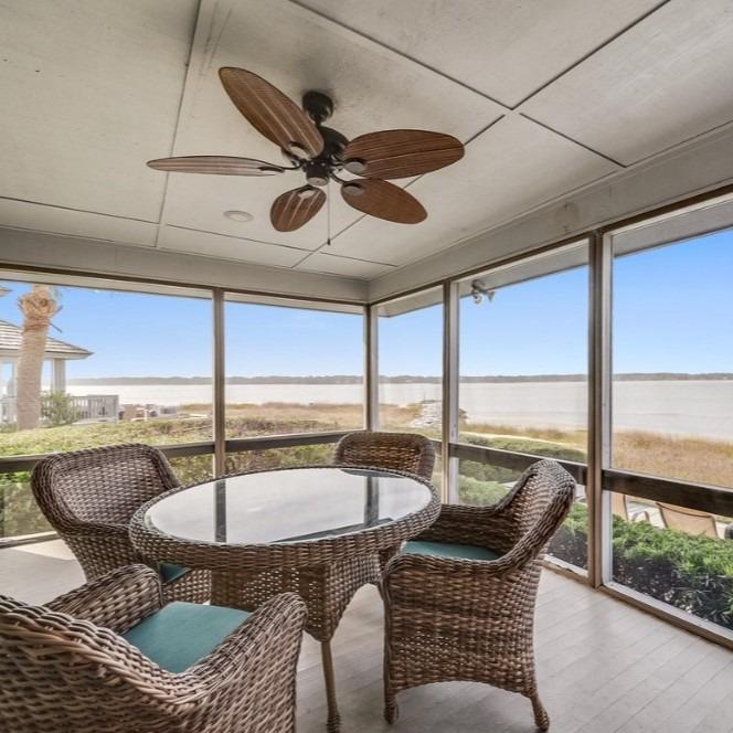 Lanai with table and beach view